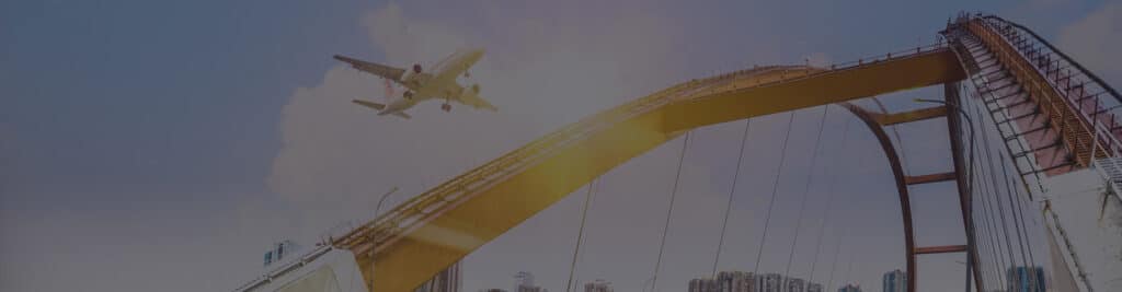 cargo airplane over bridge